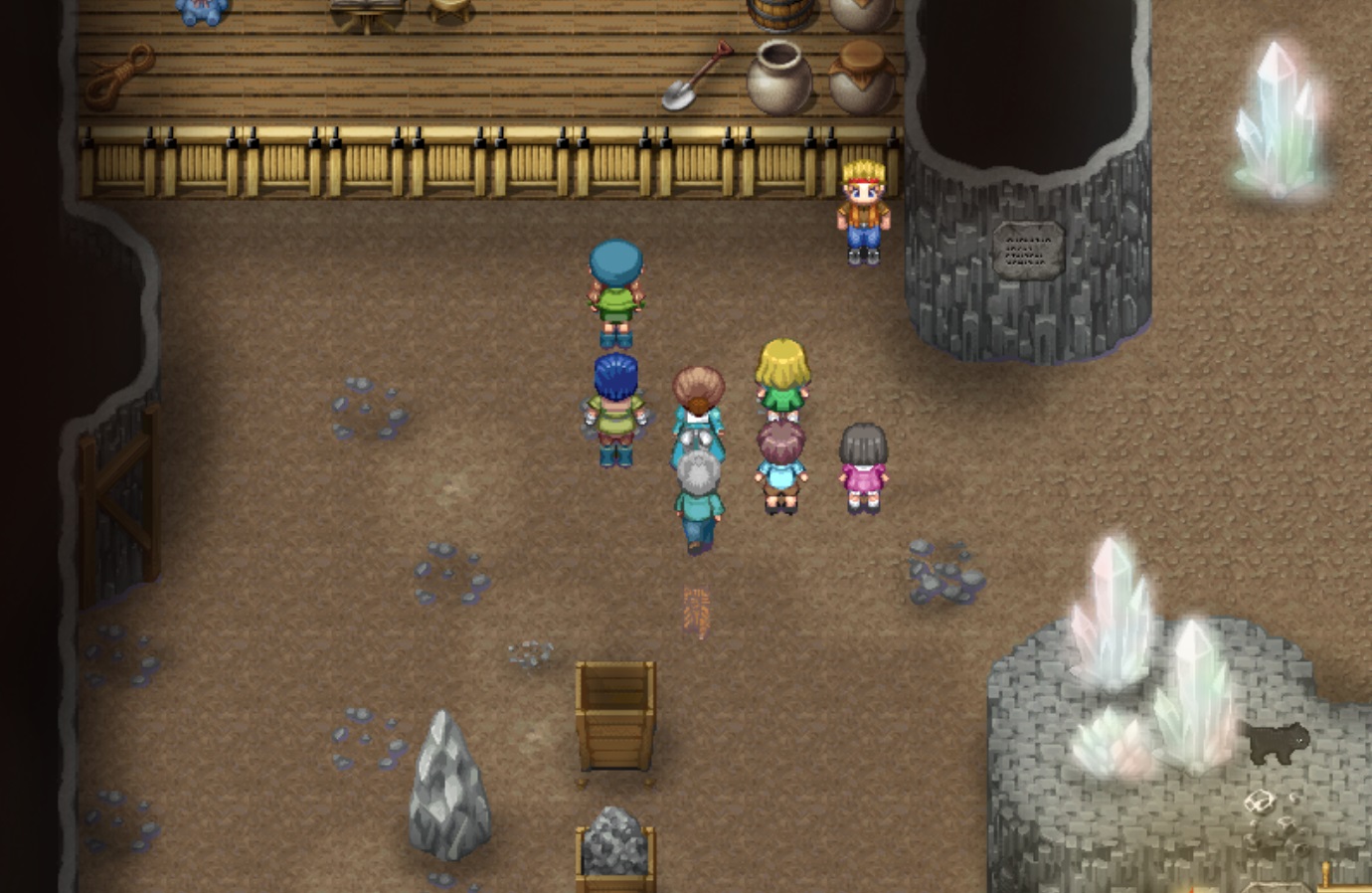 a crowd of people tour a cavern